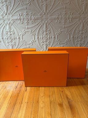 Set of three large Hermès Orange Gift Boxes with Black Trim